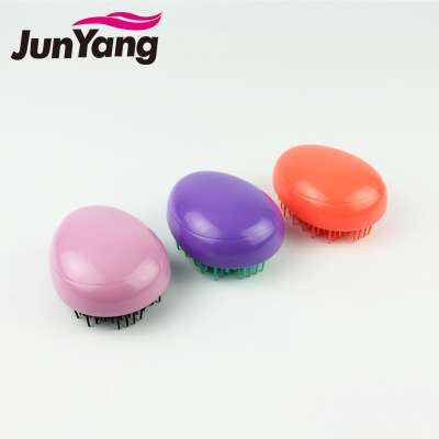 WHOLESALE EGG SHAPED MINI PLASTIC DETANGELER BRUSH IN ABS COLOR